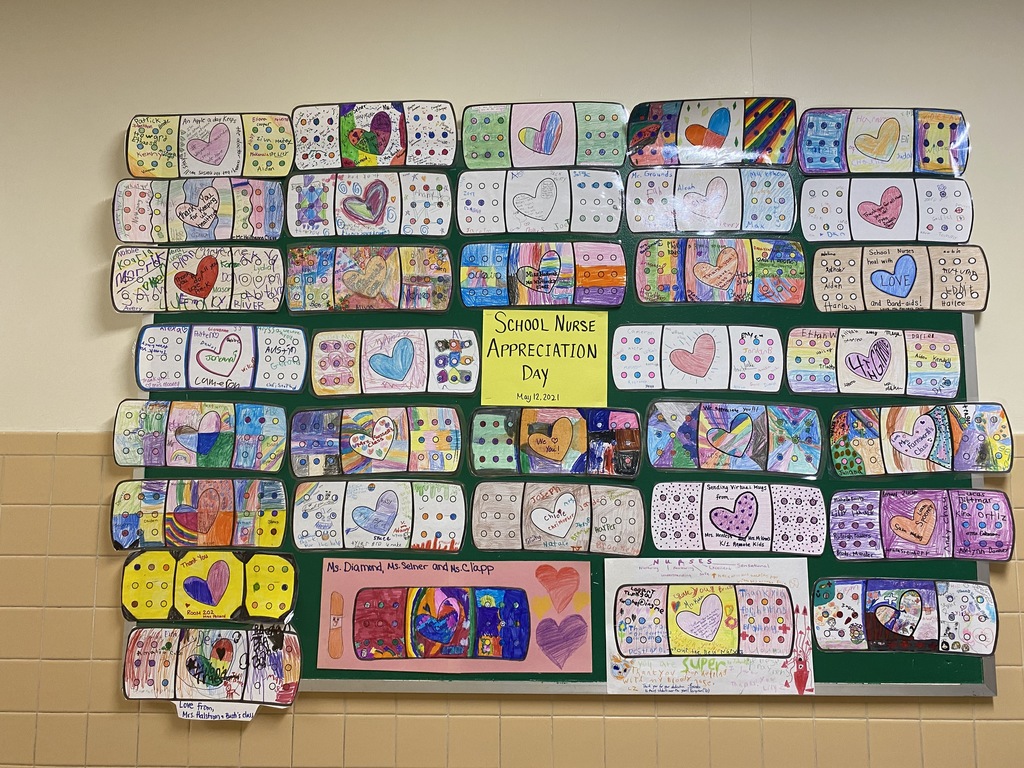 bulletin board with colored bandage drawings