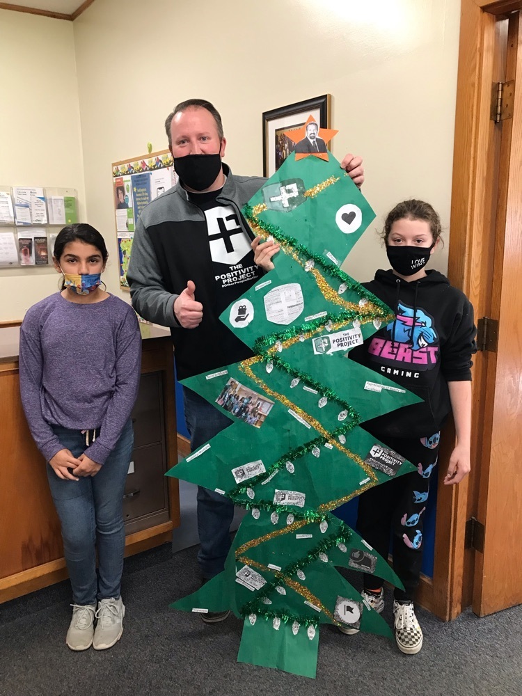 Mr. Stein and students with his tree