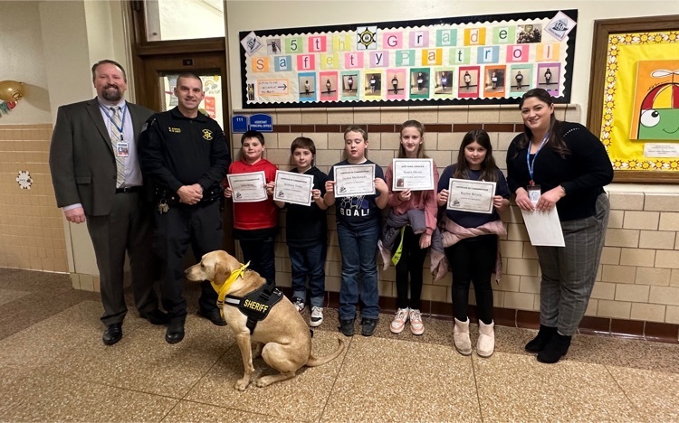students getting safety patrol awards 