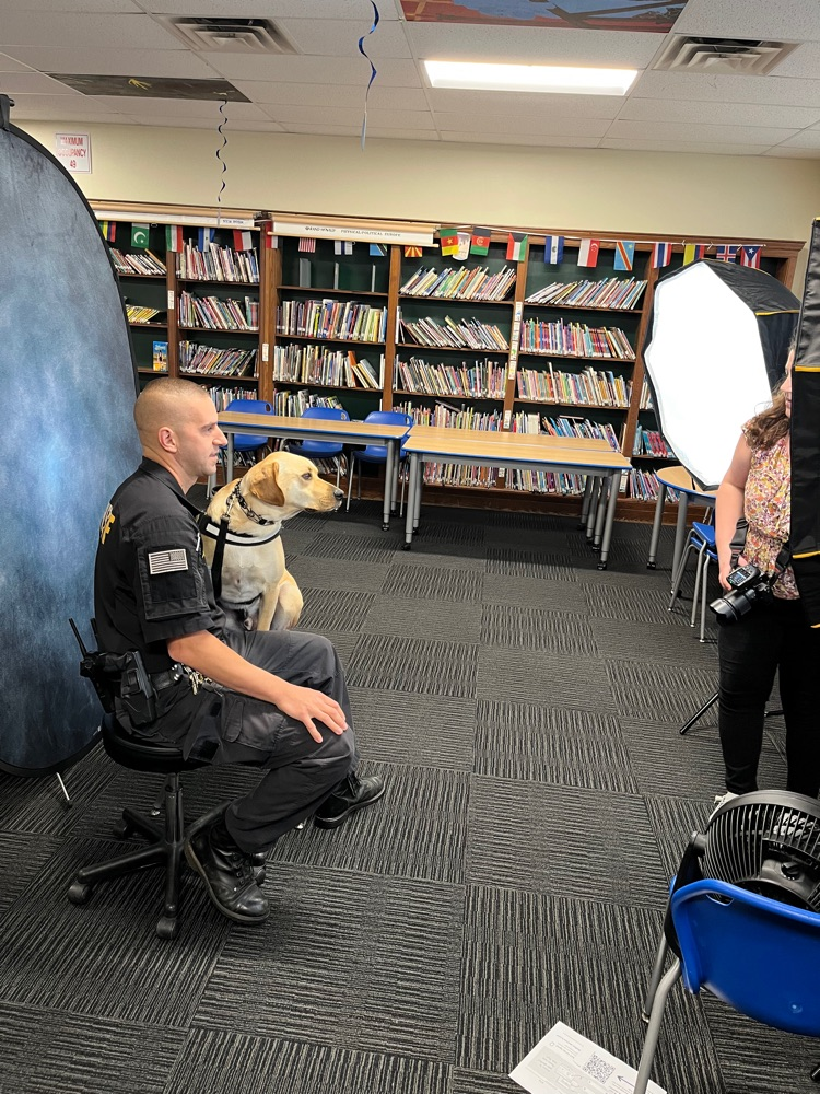 Mac and deputy Espel getting their picture taken 
